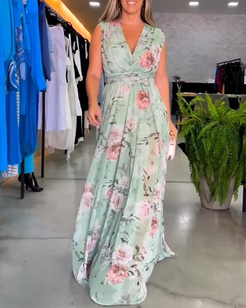 Gia | Robe longue sans manches à fleurs avec fente