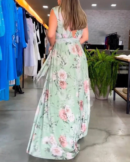 Gia | Robe longue sans manches à fleurs avec fente